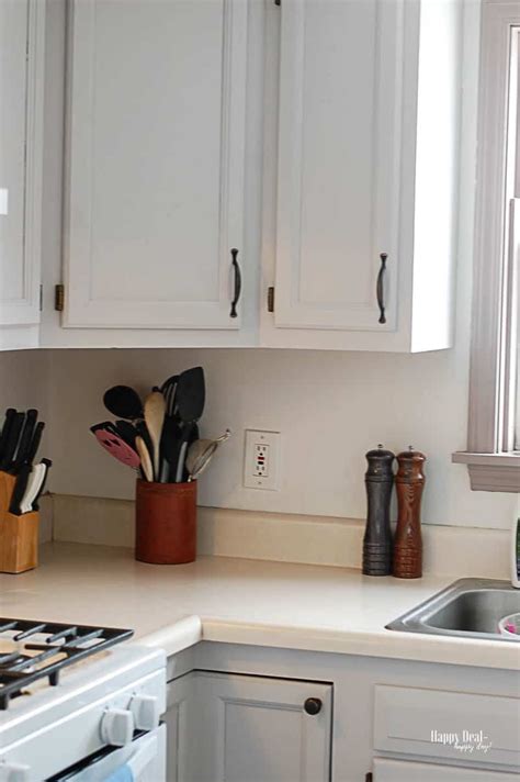 Use a brush to get into corners and detailed areas. How To Paint Kitchen Cabinets Without Sanding | Happy Deal ...