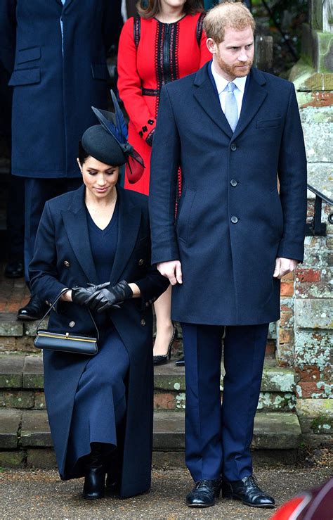 see meghan markle s perfect curtsy to the queen and how much it s improved since last christmas