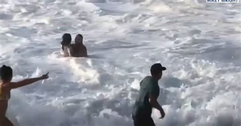 pro surfer rescues woman swept out to sea