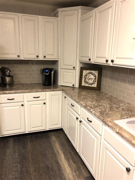 White kitchen, LifeProof vinyl seasoned wood flooring, subway tiles