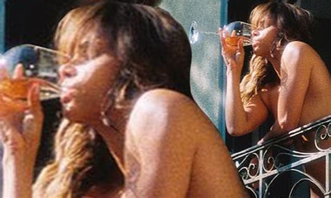 Halle Berry Poses NUDE On A Balcony As She Sips From A Glass Of Wine Daily Mail Online