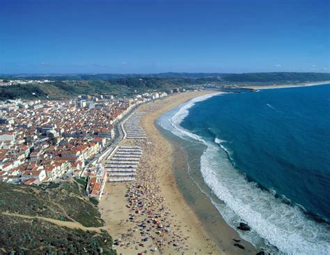Portugal's most picturesque fishing village. Nazare Beach | Portugal Travel Guide Photos