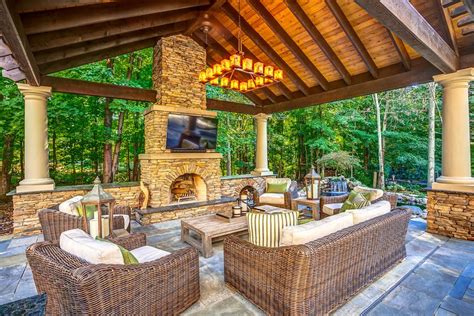 Stone Patio With Outdoor Kitchen, Hot Tub and Koi Pond | Hidden Creek ...