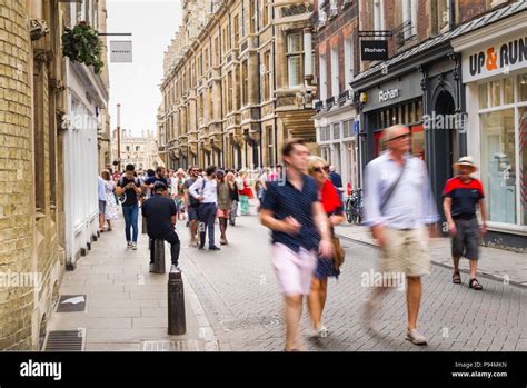 Pedestrians Walking Along Trinity Street Cambridge Uk Stock Photo Alamy