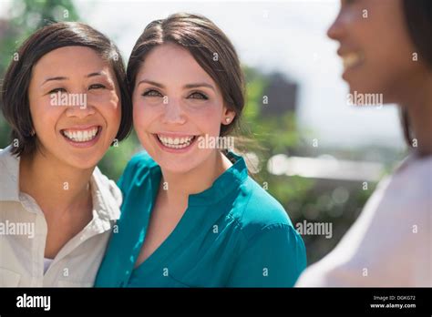 Women Laughing Outside Stock Photo Alamy