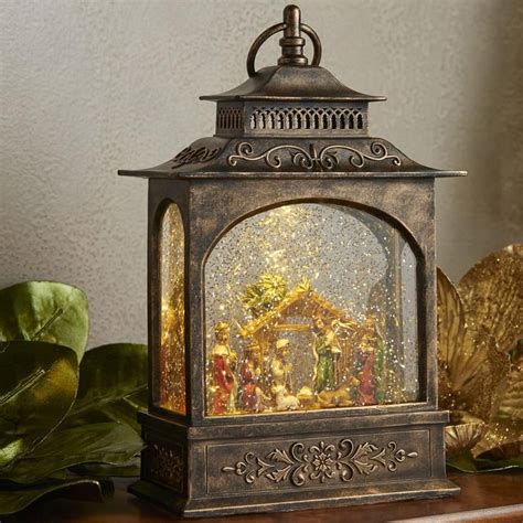 Bronze Picture Window Water Lantern Featuring A Traditional Nativity