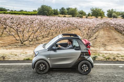 While its size is great for parking and the little car zips in and out of traffic with ease, in city driving, where the transmission. 2016 Smart Fortwo Cabrio 90 Twinamic review review | Autocar