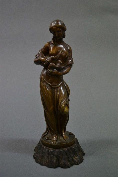 Bronze Lady With Doves On Iron Base 9 Words Figuresgroups Sculpturestatuary