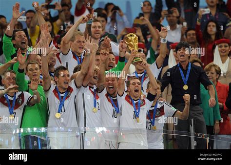 Philipp Lahm Of Germany Lifts The Trophy Following The 2014 Fifa World