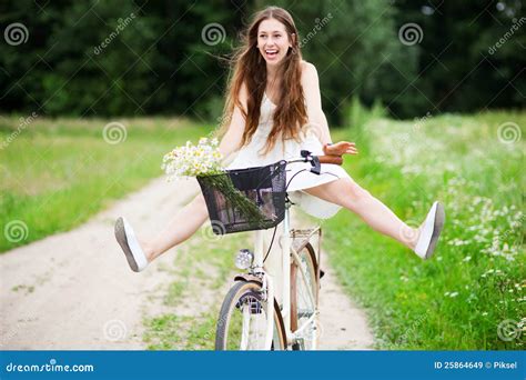 Woman Riding Bicycle With Her Legs In The Air Royalty Free Stock Images Image 25864649