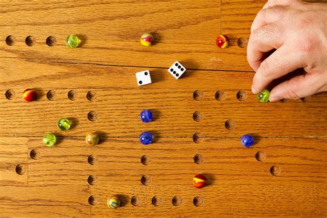 Marbles Board Game Hand 1 A Photograph By John Brueske