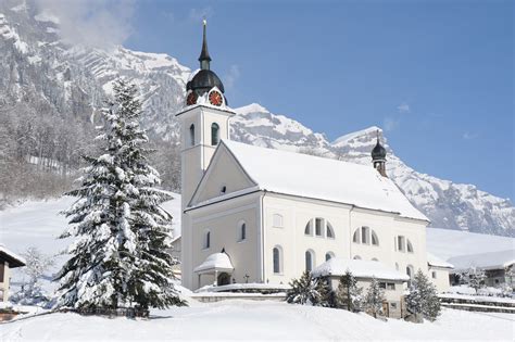 Idyllic Winter Church In Snow Hoodoo Wallpaper