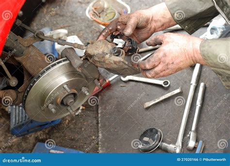 Mechanic Fits New Brake Pads Into Caliper Stock Photo Image Of
