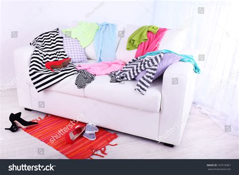 Messy Colorful Clothing On Sofa On Stock Photo 197518361 Shutterstock