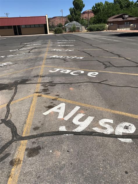 The Parking Spaces In This Parking Lot At A High School In Utah Have