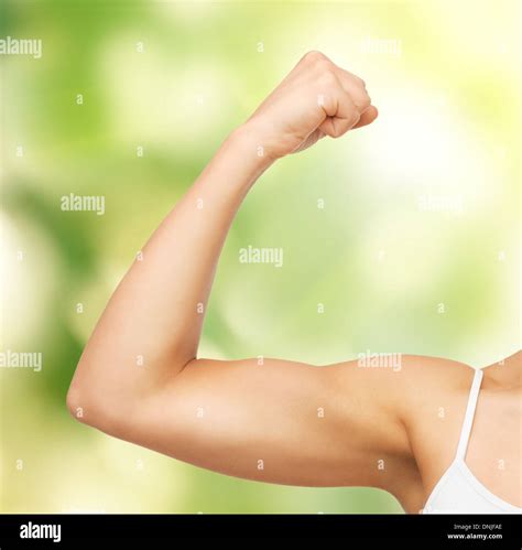 Sporty Woman Flexing Her Biceps Stock Photo Alamy