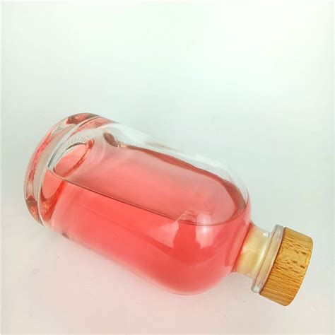 Wholesale 500ml Round Clear Glass Bottle For Beverage With Cork