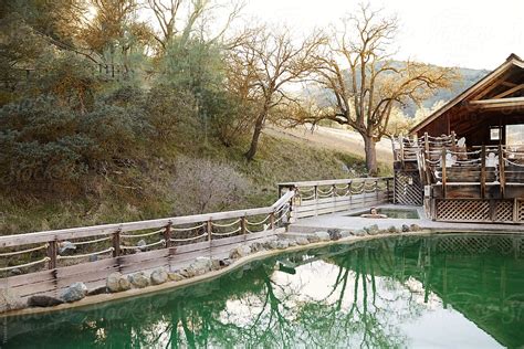 Woman Relaxing In Pool At Japanese Hot Springs Spa By Stocksy Contributor Trinette Reed
