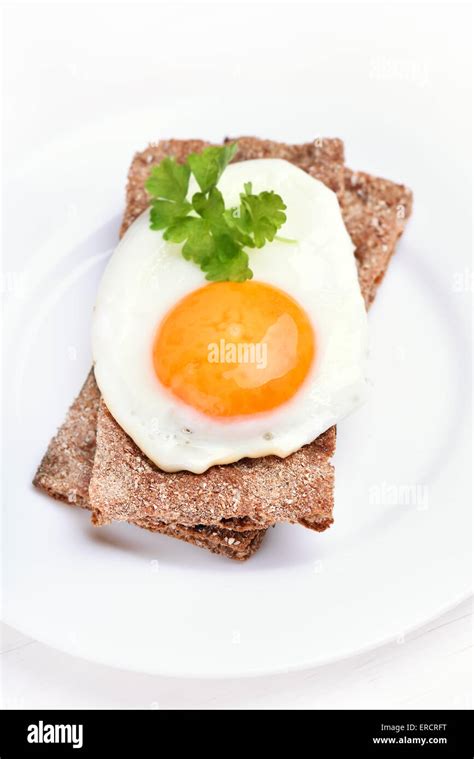 Fried Egg On Bread Top View Stock Photo Alamy