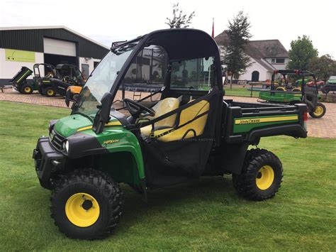 Thinks he runs a dating service. John Deere Gator HPX 815 e nieuw! - De Kock Machines