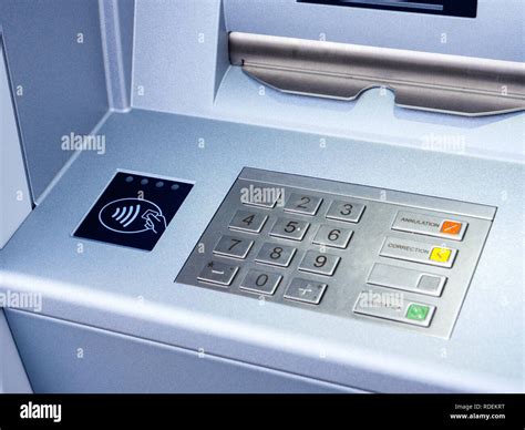 New Modern ATM Bank Teller Automatic Bank Machine With Contactless Sign Next To The Keyboard