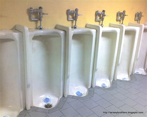 Men At Urinal Trough