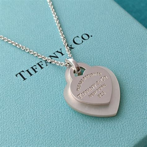 Return To Tiffany And Co Mother Of Pearl Double Heart Gem