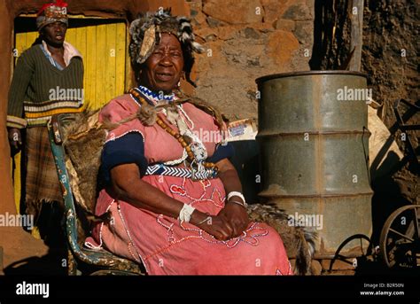 Sangoma Traditional Healer Sitting In Front Of House Lesotho Africa