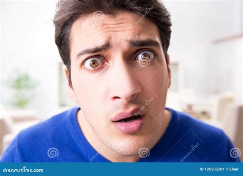 The Young Handsome Man Looking Scared And Surprised Stock Image Image