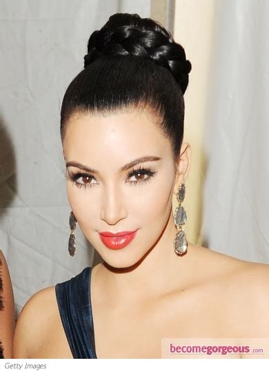 Situating the braid at the nape of her neck was the trick to keeping the look elegant and glamorous. Pictures : Kim Kardashian - Kim Kardashian Braided Bun Updo