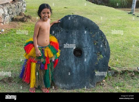 Yapese Girl In Traditional Clothing With Stone Money At Yap Day