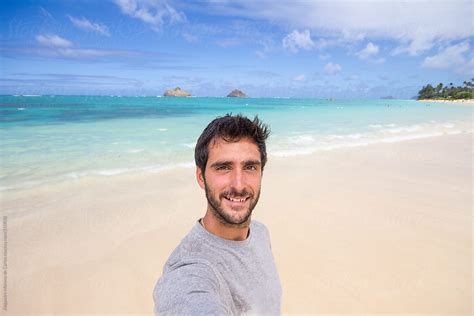 Young Man Selfie On Exotic Tropical Beach By Stocksy Contributor Alejandro Moreno De Carlos