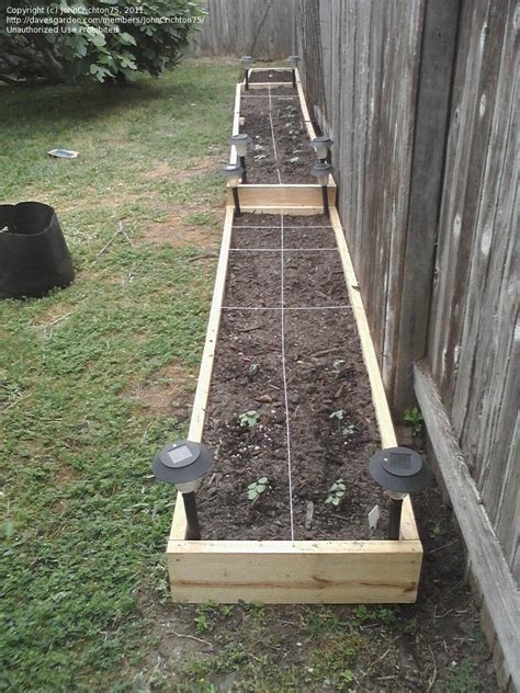 Protects the plants from strong winds. High Yield Gardening: Raised bed along fence line- ideas ...