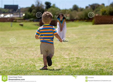 Child Running Towards Hes Mother Stock Photo Image Of