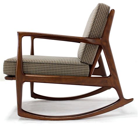 Common building materials include wood, wicker and pvc, with pads from a traditional rocking chair rocks back and forth on curved legs. Danish Modern Mid-Century Rocking Chair by Selig at 1stdibs