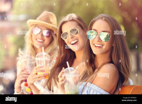 Happy Girl Friends Hanging Out In The City In Summer Stock Photo Alamy
