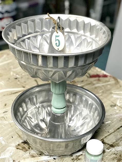 Create this dollar tree tiered tray to add farmhouse decor to your home. How to Make a Vintage Bakeware Tiered Tray