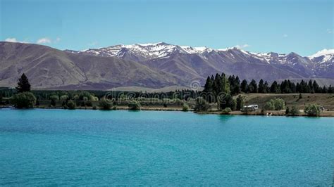 Glacier Lake View With Background Of Snowy Mount Cook On A Sunny Day