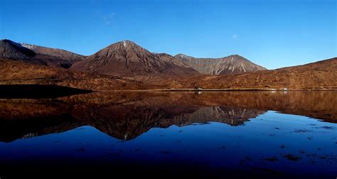 Red Cuillin Mountains Reflection In Sea Photograph By Calum Davidson