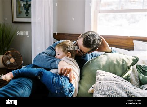Father Son Cuddling Home Hi Res Stock Photography And Images Alamy