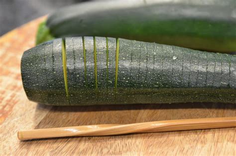 zucchini air fryer loaded keto step hassleback hasselback open chopstick slice pepper olive salt massage between each oil use