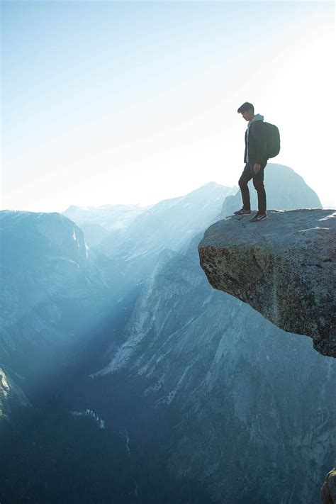 Hd Wallpaper Man Standing On Cliff Peak Mountain Daytime Hiking