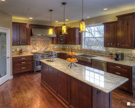 Rustic alder kitchen cabinets have an overall appearance that is characterized by a dramatic uniform graining pattern. Knotty Alder Cabinets Design Ideas, Pictures, Remodel and ...