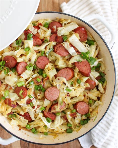 Cut the cabbage in quarters, remove any wilted leaves, cut out the core and slice each quarter approximately 1/4 inch thick. Braised Cabbage with Kielbasa and Bacon - Keto, Paleo ...