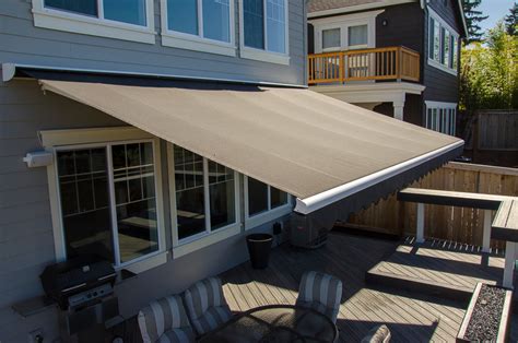 Rainier Shade Retractable Awning Over Patio In Kirkland Traditional