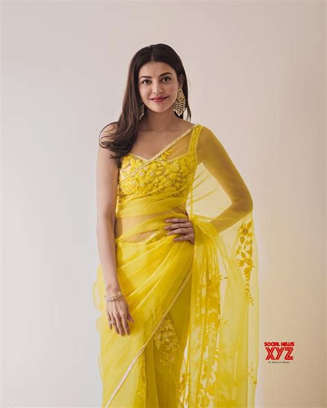 Actress Kajal Aggarwal Latest Post Wedding Glam Stills In A Yellow