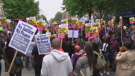 Campaigners Chant No Justice No Peace In Protest At Death Of Rashan