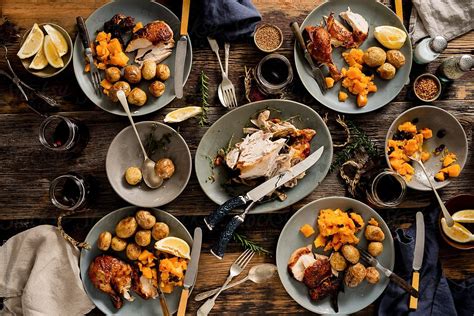 Craft a holiday menu with these delicious ideas for side dishes, main courses, and desserts. Rustic Roasted Chicken Dinner Being Consumed | Stocksy ...