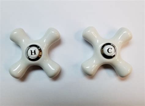 But before you do anything else, make sure to locate the water cutoff so you can turn off the water to the faucet. Old Style Porcelain Cross Handles for Wolverine Tub Faucet - Noel's Plumbing Supply