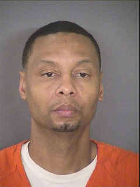 Four charged in 2006 homicide